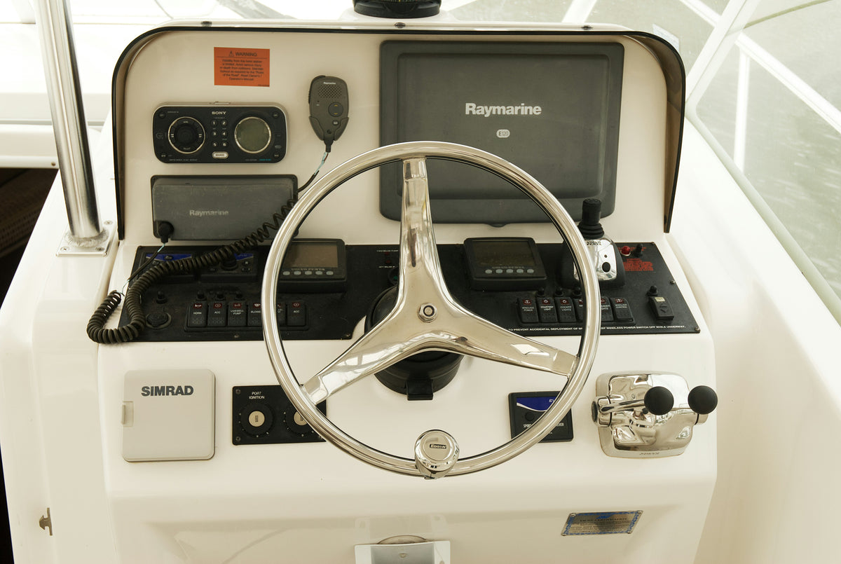 Boater at the helm on the water